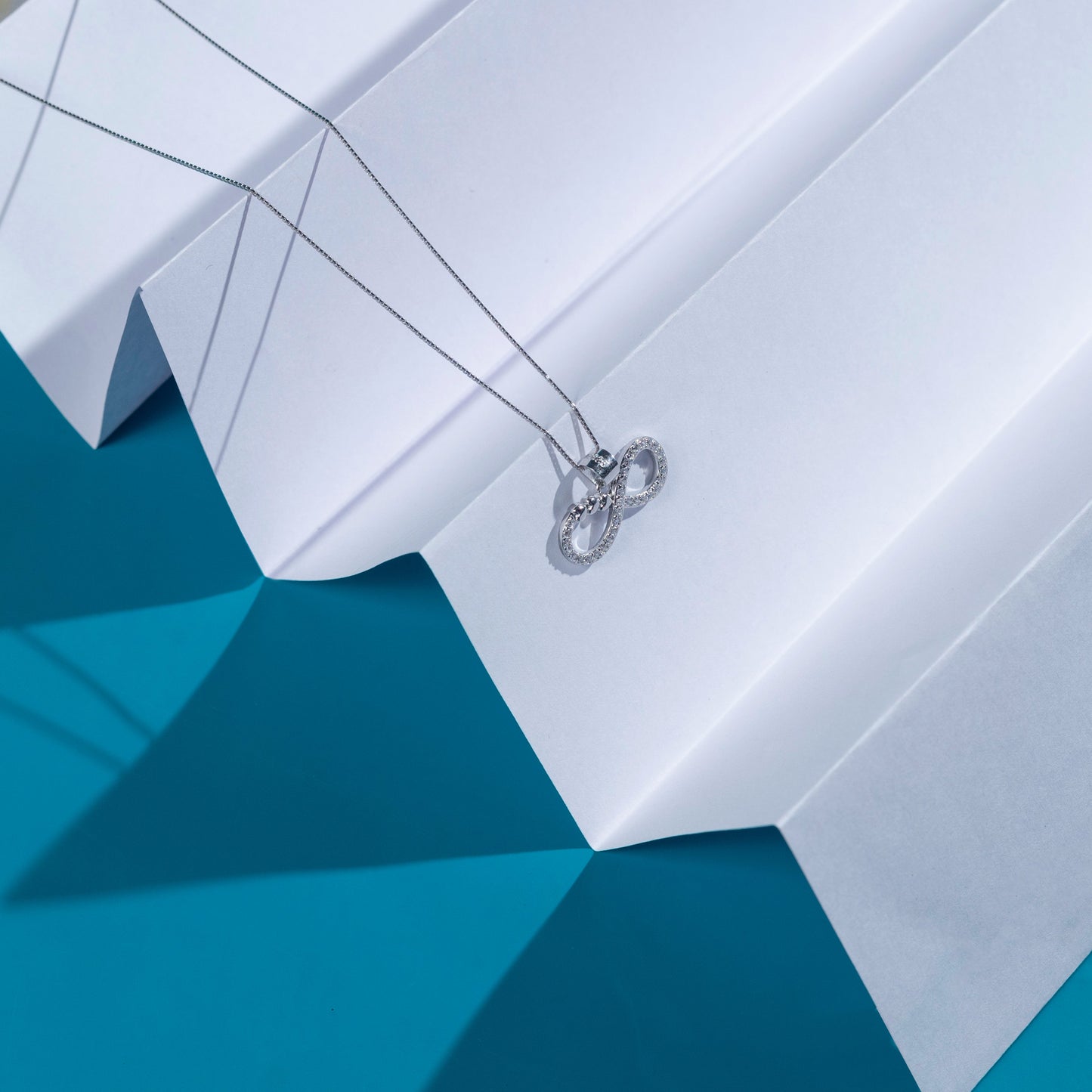 Radiant Silver Heart Infinity Necklace