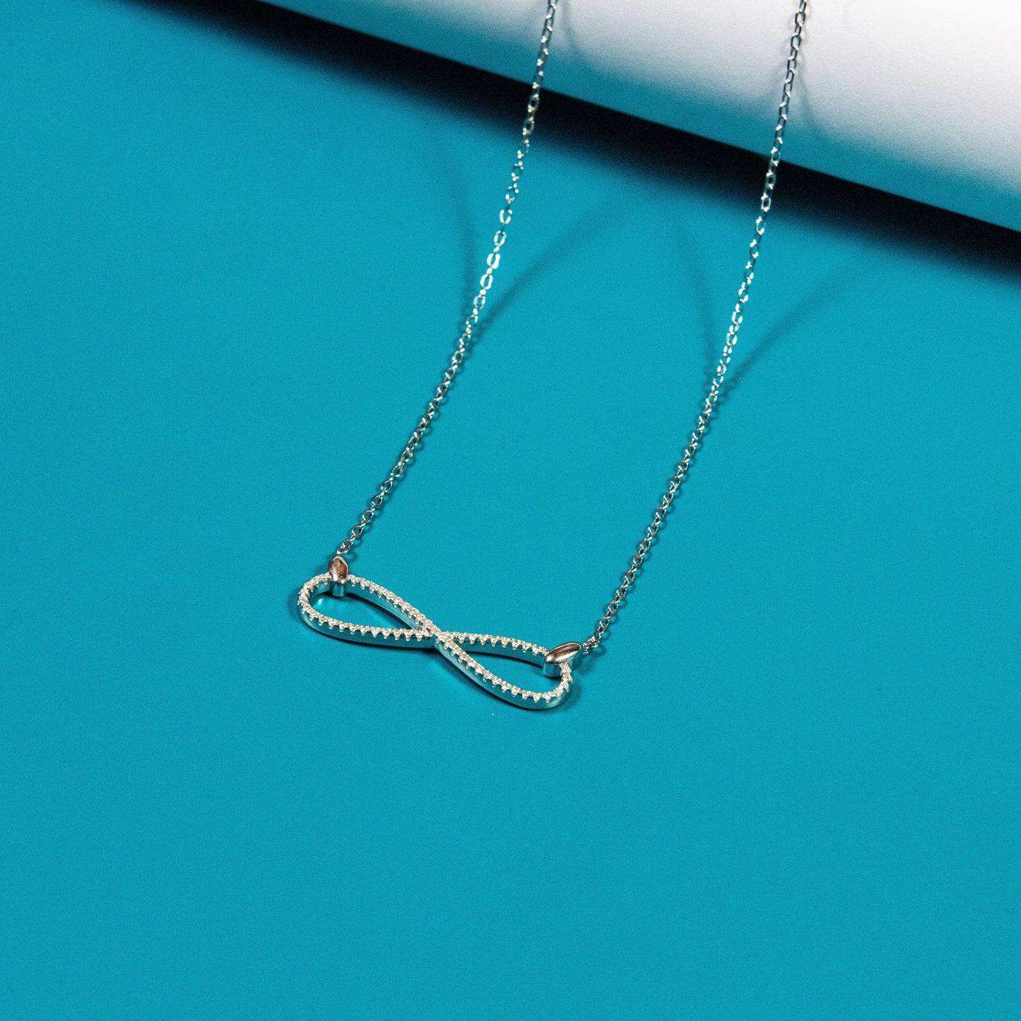 Elegant silver loop radiant necklace