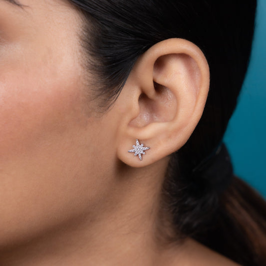 Radiant star-shaped earrings in pure silver