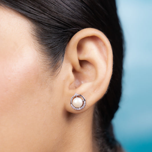 Graceful silver pearl accents sparkle subtly