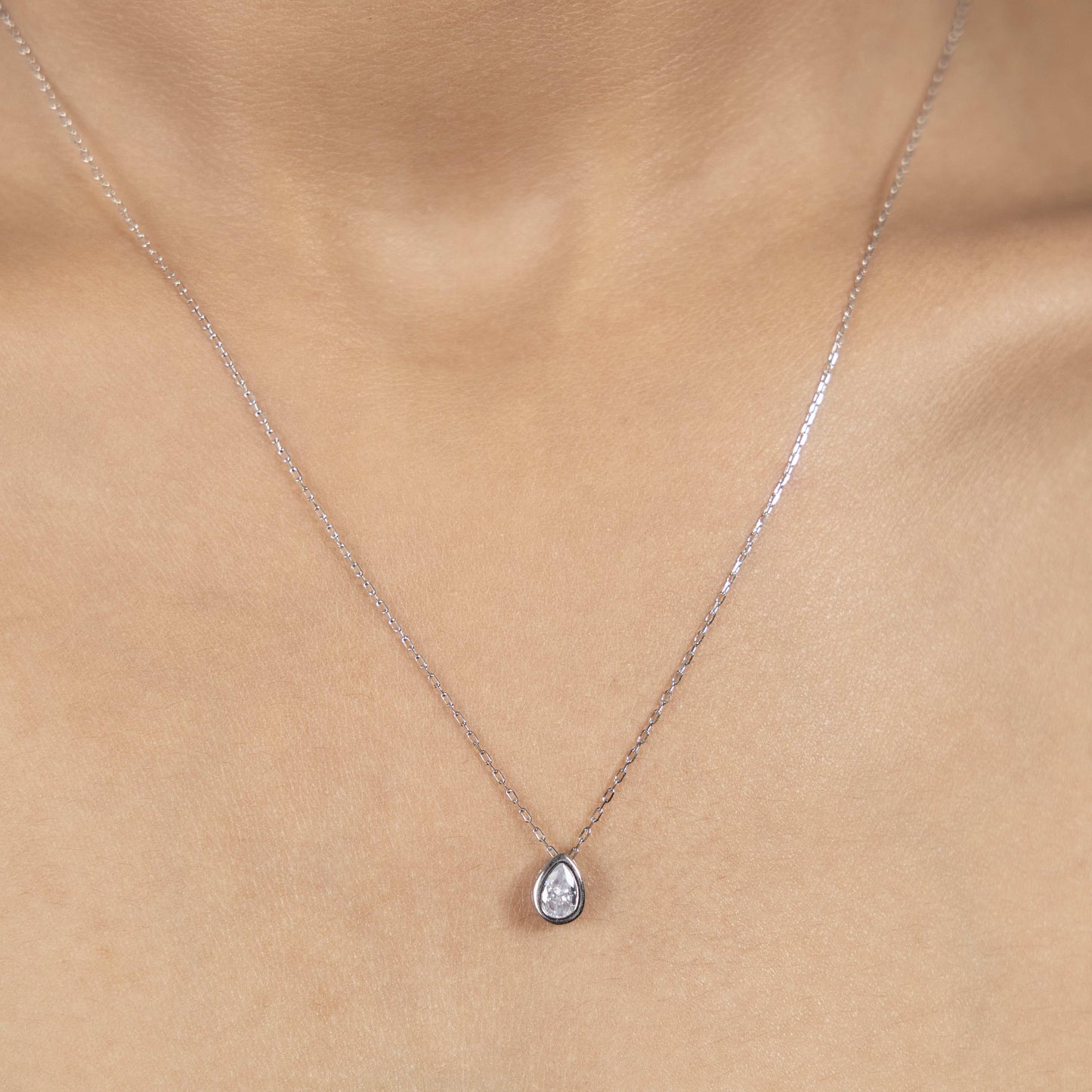 Unique Silver Teardrop Mirage Necklace Design