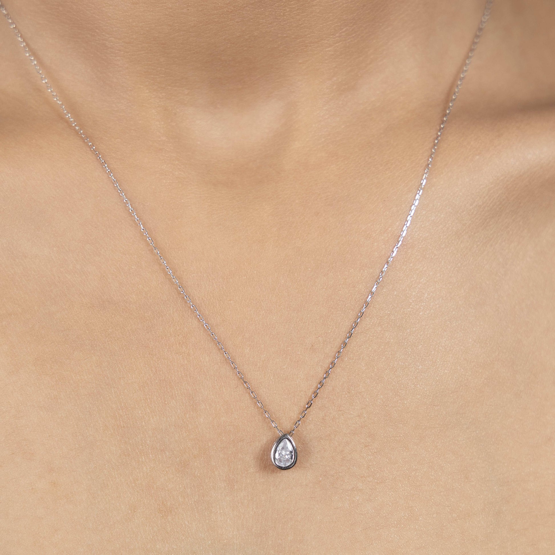 Unique Silver Teardrop Mirage Necklace Design