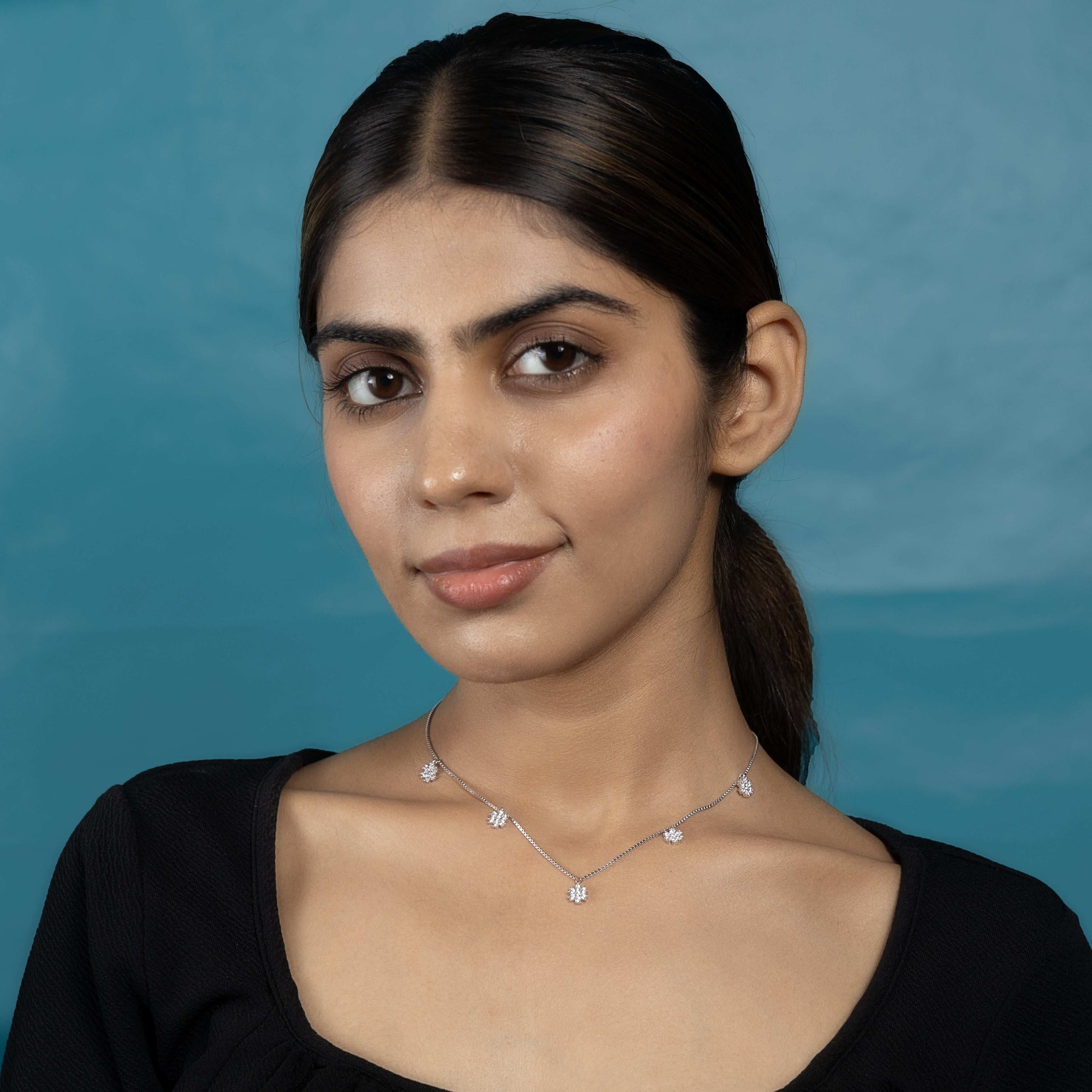 Sophisticated Silver Blossom Cascade Necklace Look